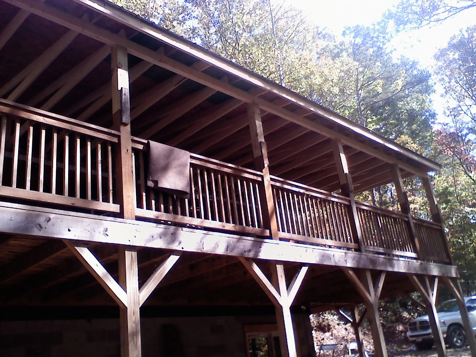 Timber framing under a new elevated porch and deck — Roof Leak Repair in Pecatonica by Roofing Brothers